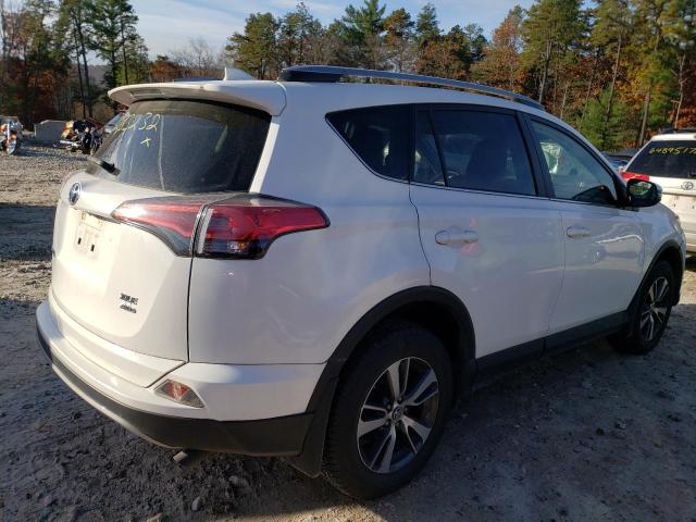 Photo 4 from auction – 2017 TOYOTA RAV4 XLE with VIN JTMRFREV6HJ171677