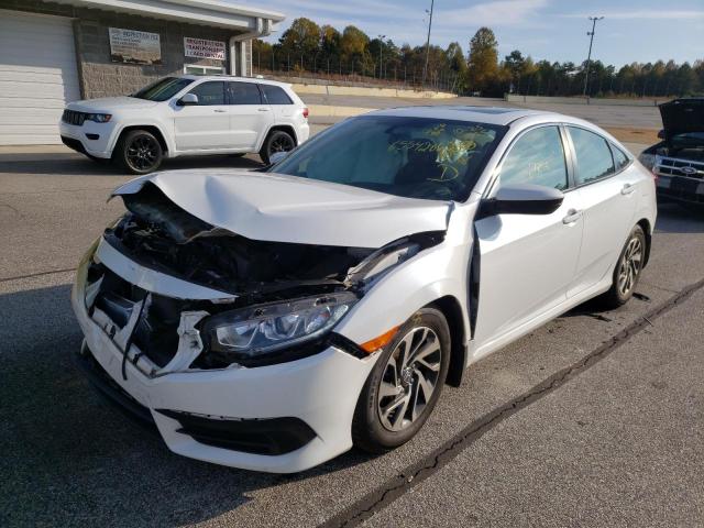Photo 2 from auction – 2018 HONDA CIVIC EX with VIN 19XFC2F70JE038855