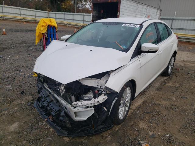 Photo 2 from auction – 2015 FORD FOCUS TITA with VIN 1FADP3J27FL291916