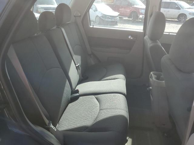 Photo 6 from auction – 2010 MAZDA TRIBUTE I with VIN 4F2CY0C74AKM07338