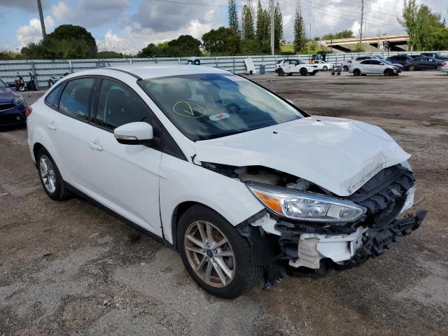 FORD FOCUS SE 2017 with VIN 1FADP3F28HL227976 - Photo from auction