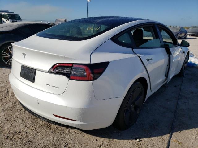 Photo 4 from auction – 2021 TESLA MODEL 3 with VIN 5YJ3E1EB6MF859129