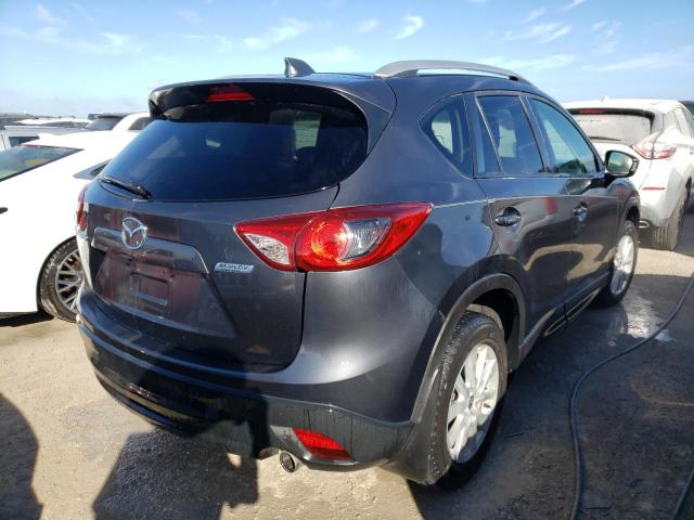 Photo 4 from auction – 2014 MAZDA CX-5 TOURI with VIN JM3KE2CY9E0337787