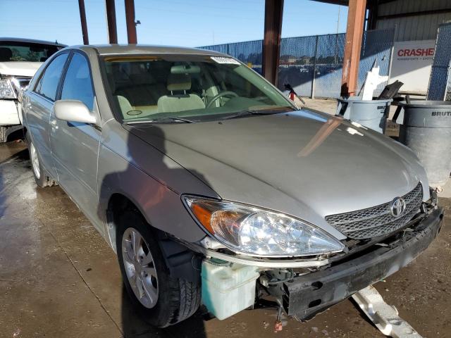 TOYOTA CAMRY LE 2004 with VIN 4T1BF32K24U571412 - Photo from auction