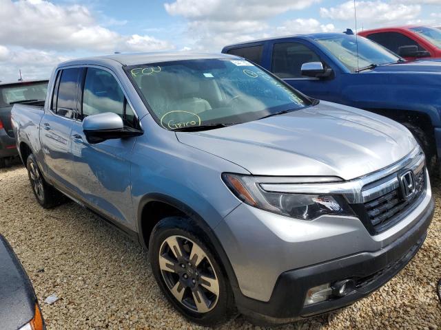 HONDA RIDGELINE 2015 with VIN 5FPYK2F62JB002279 - Photo from auction