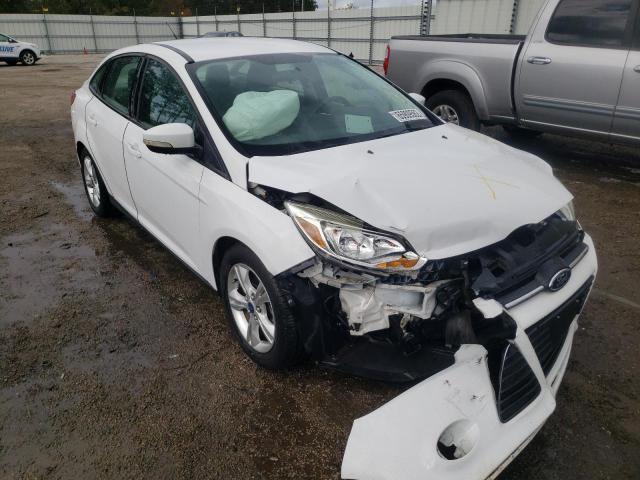 FORD FOCUS SE 2014 with VIN 1FADP3F28EL121300 - Photo from auction