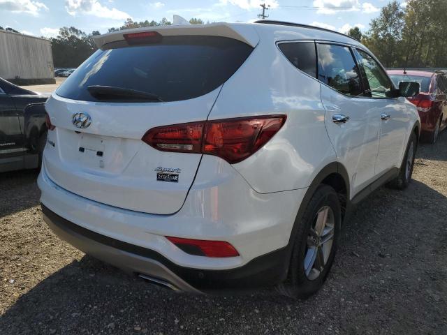 Photo 4 from auction – 2017 HYUNDAI SANTA FE S with VIN 5NMZU3LB2HH035600