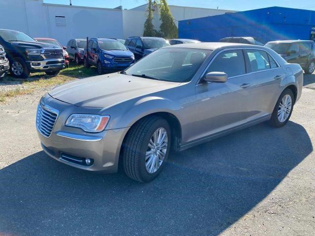 Photo 2 from auction – 2014 CHRYSLER 300 with VIN 2C3CCARG7EH323236