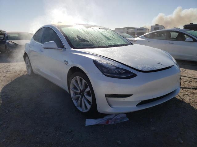 TESLA MODEL 3 2017 with VIN 5YJ3E1EA6HF000507 - Photo from auction