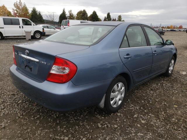 Photo 4 from auction – 2002 TOYOTA CAMRY LE with VIN JTDBE32K620070910