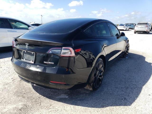 Photo 4 from auction – 2022 TESLA MODEL 3 with VIN 5YJ3E1EC8NF109368