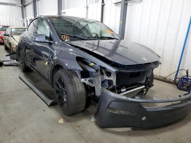 TESLA MODEL Y 2022 with VIN 7SAYGDEE7NF387362 - Photo from auction