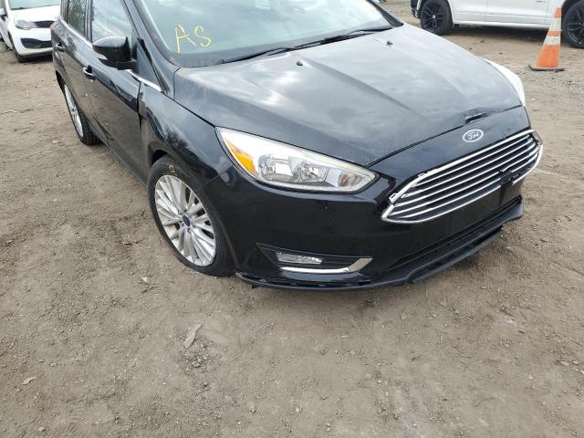Photo 9 from auction – 2016 FORD FOCUS TITA with VIN 1FADP3N27GL386018