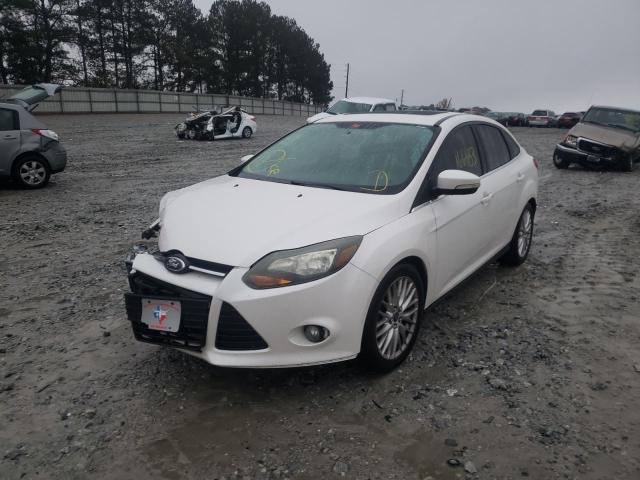 Photo 2 from auction – 2014 FORD FOCUS TITA with VIN 1FADP3J25EL217649