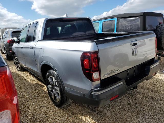 Photo 3 from auction – 2015 HONDA RIDGELINE with VIN 5FPYK2F62JB002279