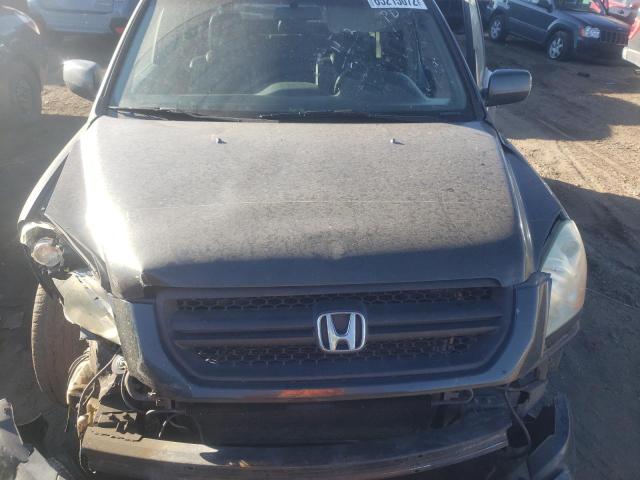 Photo 7 from auction – 2004 HONDA PILOT EXL with VIN 2HKYF18574H524665