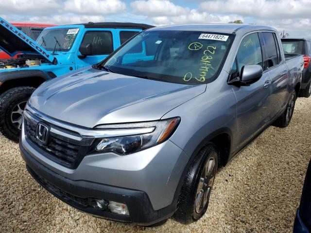 Photo 2 from auction – 2015 HONDA RIDGELINE with VIN 5FPYK2F62JB002279