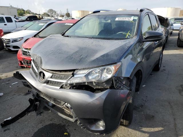 Photo 2 from auction – 2014 TOYOTA RAV4 LE with VIN JTMBFREV0ED072140