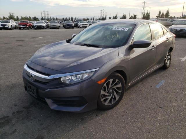 Photo 2 from auction – 2018 HONDA CIVIC EX with VIN 2HGFC2F76JH545796