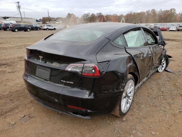 Photo 4 from auction – 2022 TESLA MODEL 3 with VIN 5YJ3E1EB0NF186002