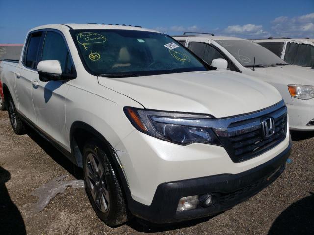HONDA RIDGELINE 2019 with VIN 5FPYK2F65KB002875 - Photo from auction