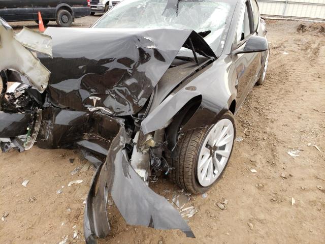 Photo 10 from auction – 2022 TESLA MODEL 3 with VIN 5YJ3E1EB0NF186002