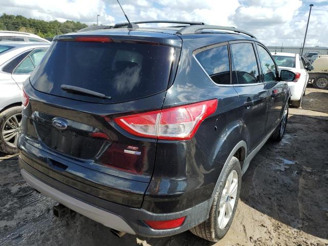 Photo 4 from auction – 2014 FORD ESCAPE SE with VIN 1FMCU9G97EUC98200