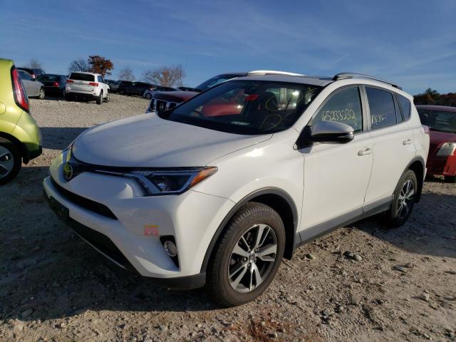 Photo 2 from auction – 2017 TOYOTA RAV4 XLE with VIN JTMRFREV6HJ171677