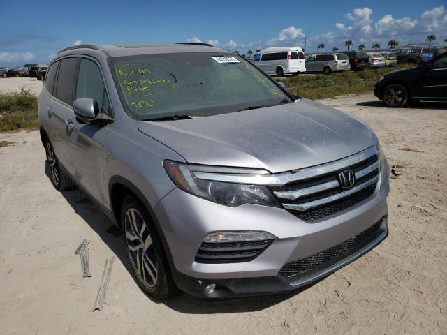 HONDA PILOT 2016 with VIN 5FNYF6H9XGB127258 - Photo from auction