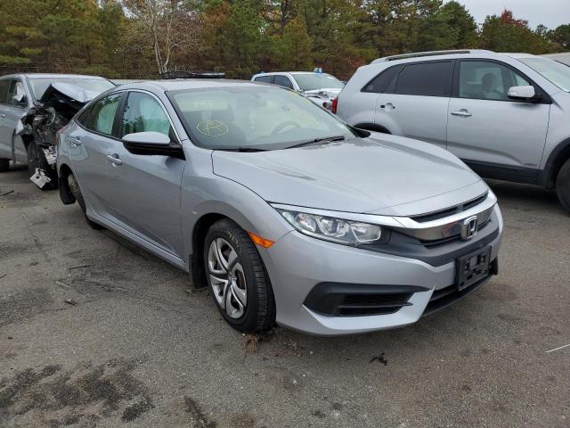 HONDA CIVIC LX 2018 with VIN 19XFC2F56JE201040 - Photo from auction