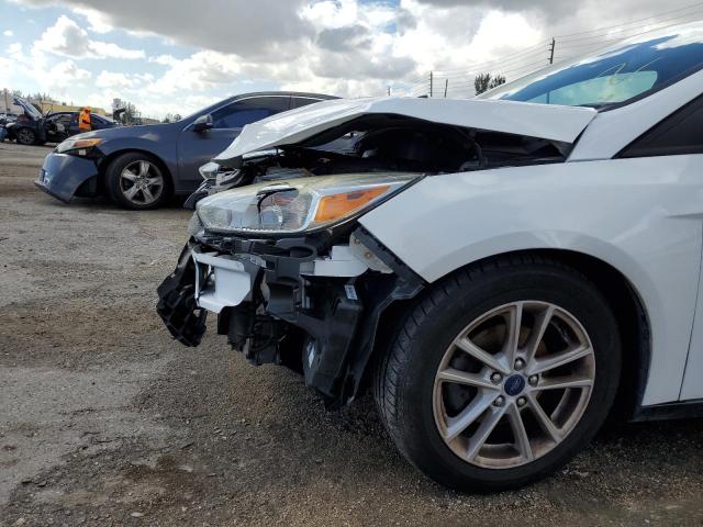 Photo 9 from auction – 2017 FORD FOCUS SE with VIN 1FADP3F28HL227976