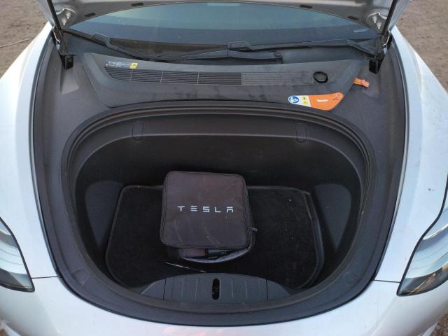 Photo 7 from auction – 2018 TESLA MODEL 3 with VIN 5YJ3E1EA4JF010359
