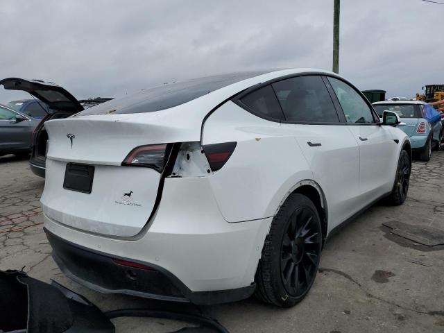 Photo 4 from auction – 2021 TESLA MODEL Y with VIN 5YJYGDEE2MF144425