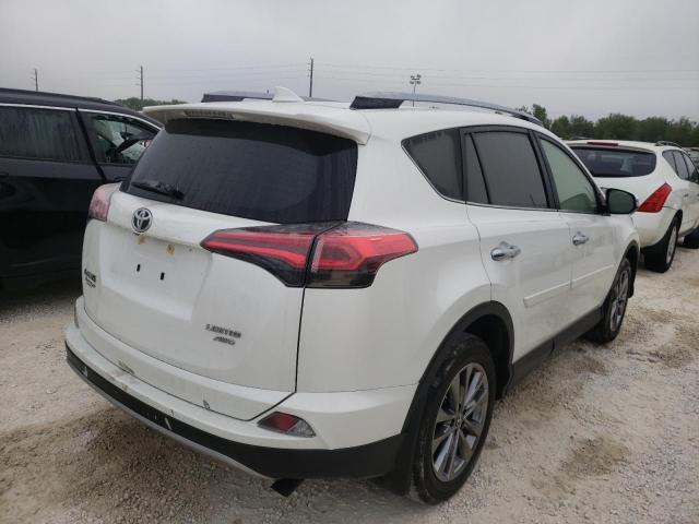 Photo 4 from auction – 2018 TOYOTA RAV4 LIMIT with VIN JTMDFREV1JJ220428