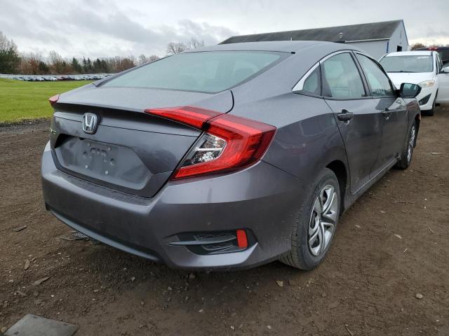 Photo 4 from auction – 2018 HONDA CIVIC LX with VIN 19XFC2F59JE018585