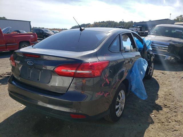 Photo 4 from auction – 2018 FORD FOCUS S with VIN 1FADP3E28JL269314