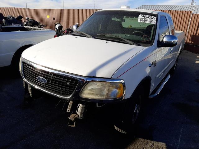 Photo 2 from auction – 2000 FORD F150 with VIN 1FTRX17W0YNB65340