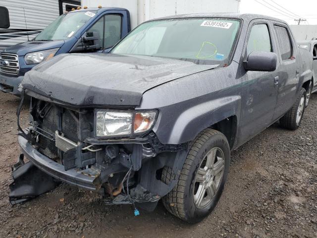 Photo 2 from auction – 2014 HONDA RIDGELINE with VIN 5FPYK1F55EB008441