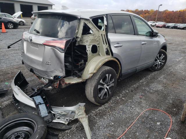 Photo 4 from auction – 2018 TOYOTA RAV4 LE with VIN 2T3BFREV5JW709035