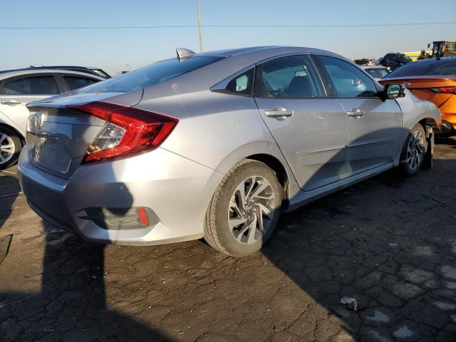 Photo 4 from auction – 2018 HONDA CIVIC EX with VIN 19XFC2F79JE007040