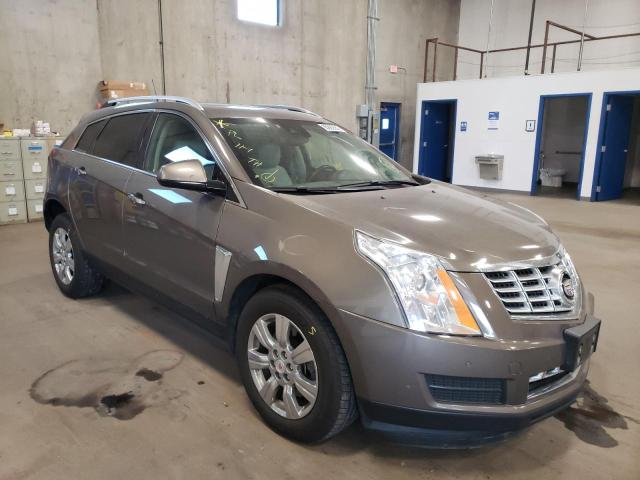 CADILLAC SRX 2014 with VIN 3GYFNEE31ES678603 - Photo from auction