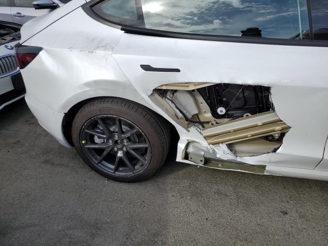 Photo 9 from auction – 2022 TESLA MODEL 3 with VIN 5YJ3E1EB9NF299401