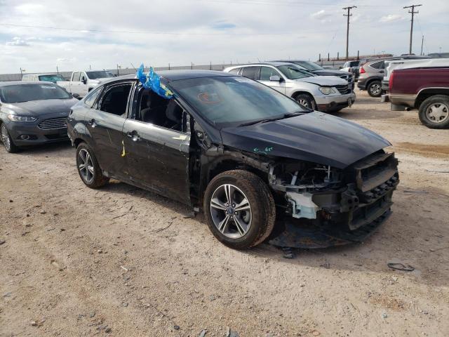 FORD FOCUS SE 2018 with VIN 1FADP3F21JL223578 - Photo from auction
