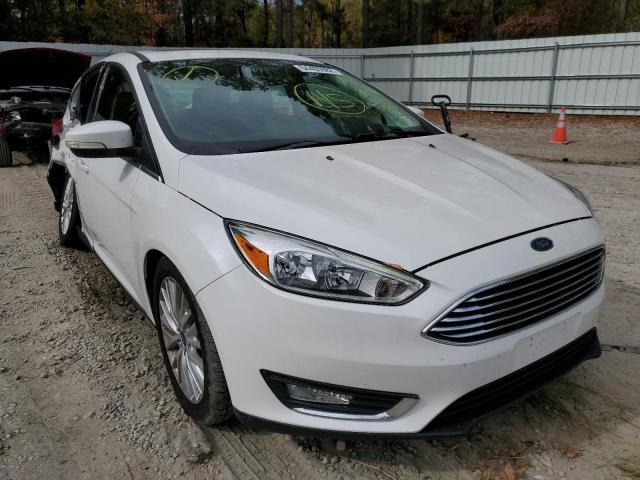 FORD FOCUS TITA 2016 with VIN 1FADP3N24GL243432 - Photo from auction