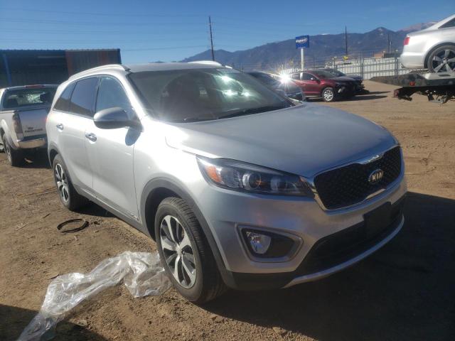 KIA SORENTO EX 2016 with VIN 5XYPHDA54GG001214 - Photo from auction