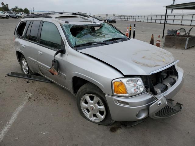 GMC ENVOY 2004 with VIN 1GKDS13S642437708 - Photo from auction