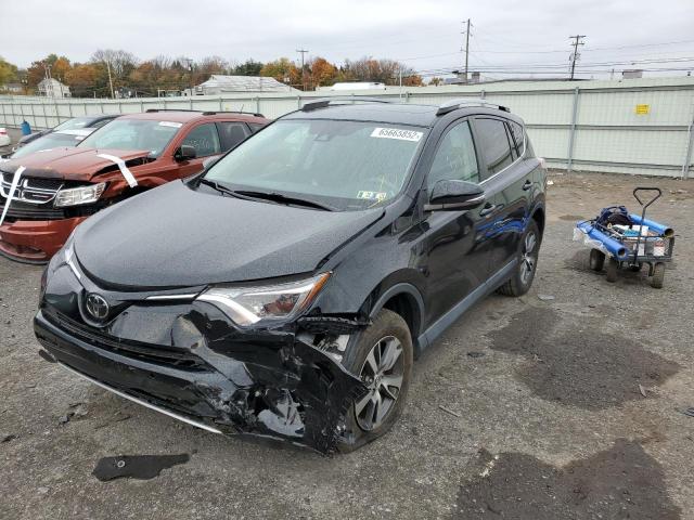 Photo 2 from auction – 2017 TOYOTA RAV4 XLE with VIN 2T3RFREV4HW565194