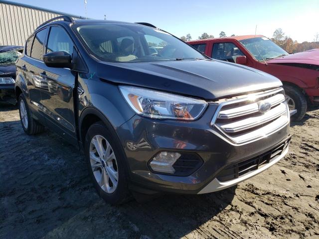 FORD ESCAPE SE 2018 with VIN 1FMCU0GD2JUC38044 - Photo from auction