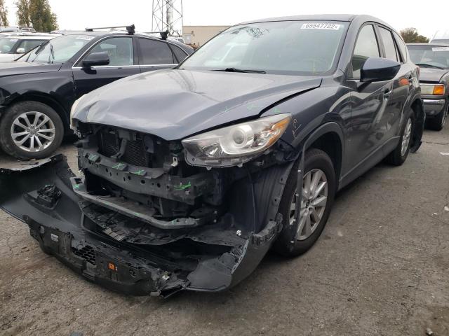 Photo 2 from auction – 2013 MAZDA CX-5 TOURI with VIN JM3KE4CE1D0105815
