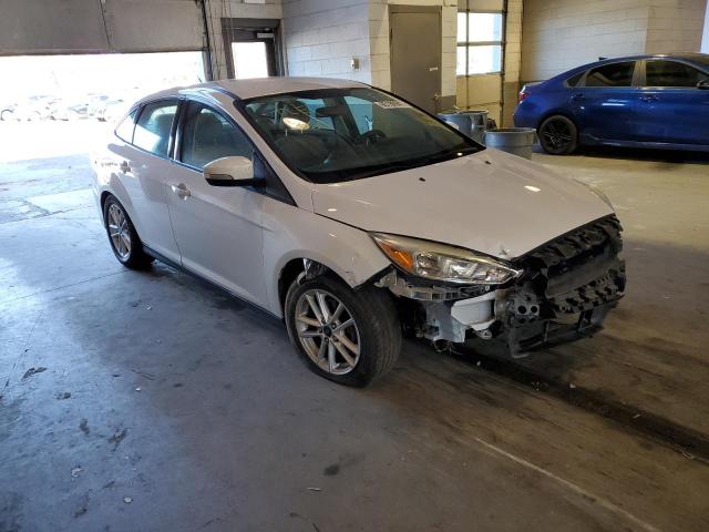 FORD FOCUS SE 2016 with VIN 1FADP3F24GL386072 - Photo from auction